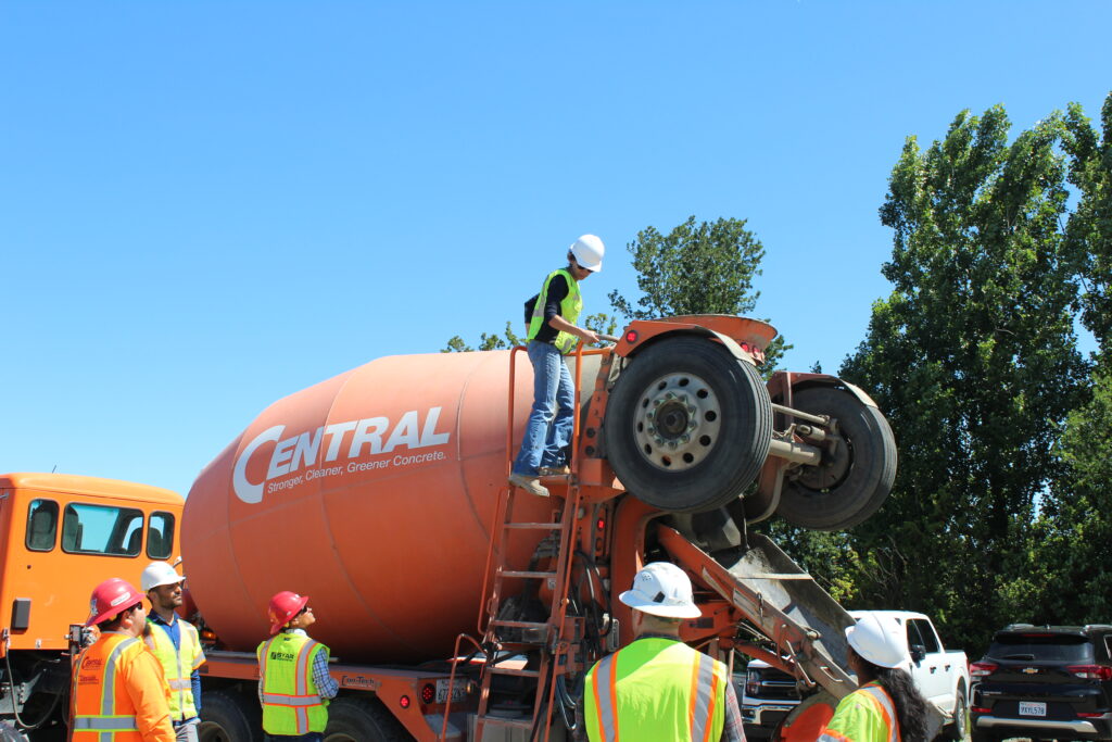 Dr. Somayeh Nassiri inspects a Central cement mixing truck.